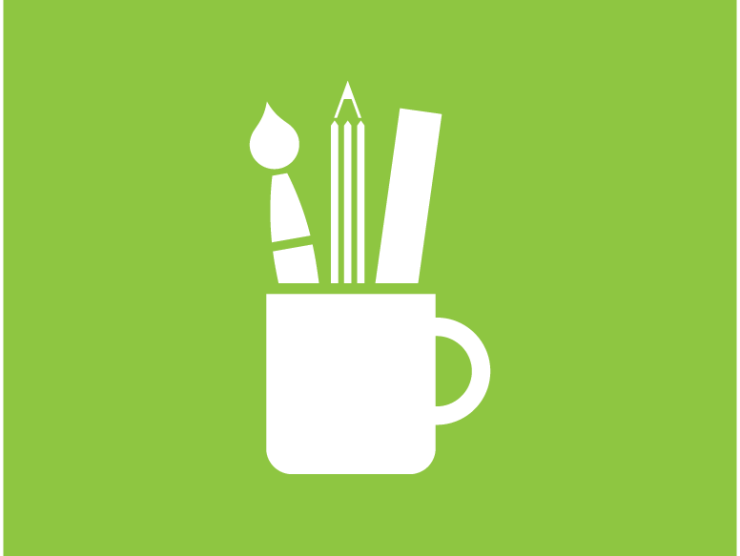 green field with white cup holding a paintbrush, pencil, and ruler