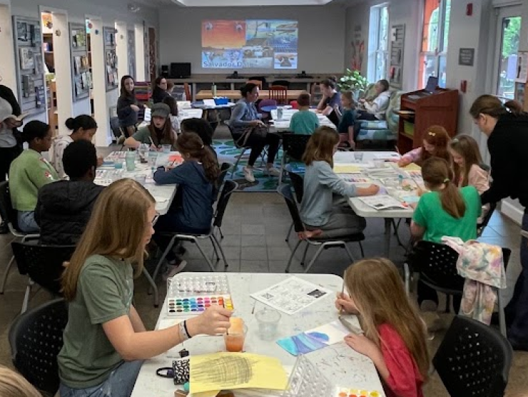 Tables of Children doing art